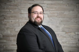 Bio headshot of Ryan L. Dize.