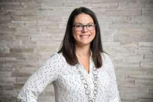 Bio headshot of Kelly Herdrich.