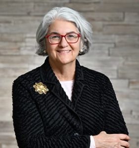 Bio headshot of Joan Leanos.
