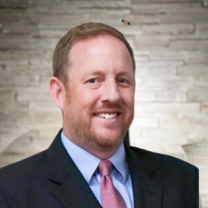 Bio headshot of Gregory Kirby.