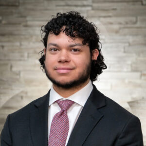 Bio headshot of Carlos Gregory.