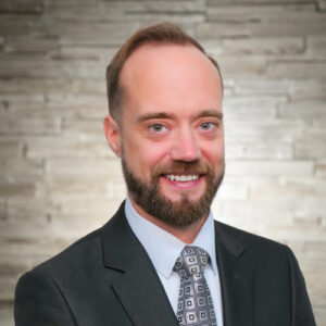 Bio headshot of Sean Rousseau.